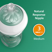 Clear glass Philips Avent baby bottle with Natural Response nipple, medium flow