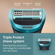 Triple protect shave system close-up with foil and black-and-teal shaving head