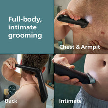 Body groomer in use on chest area, black-and-teal trimmer held against skin