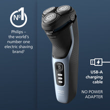 Electric shaver shown with USB-A charging cable icon and power button