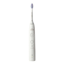 White rechargeable electric toothbrush with blue bristle head and buttons
