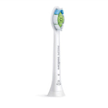 Single white replacement toothbrush head with blue and green bristle insert
