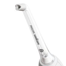 White oral irrigator handle with nozzle tip and setting marked F2