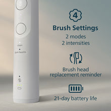 White rechargeable toothbrush handle with control buttons and brush settings icons