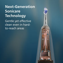 Rechargeable toothbrush with clear head showing internal bristle mechanism