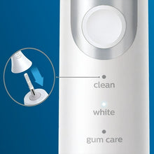 White Sonicare handle with clean, white, gum care labels