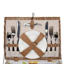 Picnic basket tray with forks, knives, spoons, and a plate with leather straps