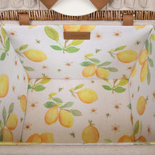Lemon-patterned picnic basket liner fabric with cream background