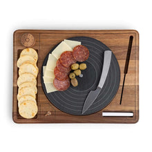 Turntable cheese board with slate record disc holding sliced meats, cheese, and crackers