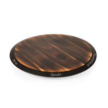 Acacia wood lazy Susan serving tray with dark rim, top view with carved text
