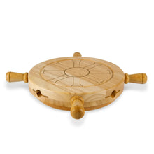 Wooden lazy Susan wheel with engraved paths and central compass-style design