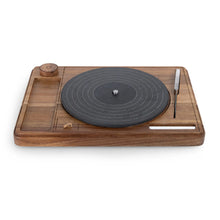 Acacia turntable cheese board with dark slate center, side knife, and wooden knob.