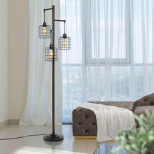 Bronze 3-light floor lamp with black cage shades and clear glass bulbs