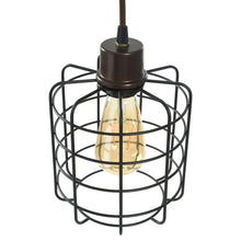 Black wire cage shade with clear glass bulb on the floor lamp