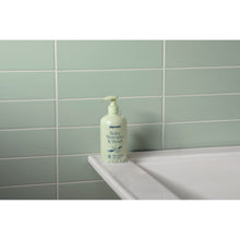Pipette baby shampoo & wash bottle with mint-green pump on bathroom ledge