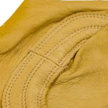 Tan leather glove palm close-up with stitched seams and curved reinforcement