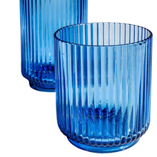Blue ribbed plastic drink cup with fluted sides and scalloped base