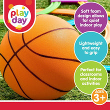 Orange basketball with colorful indoor hoop rings