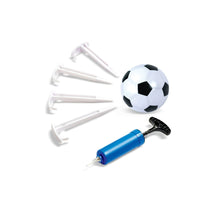 Soccer ball with blue inflating pump and white goal stakes for folding goals