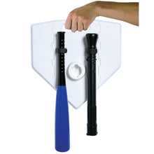 Kids t-ball tee set with two black posts mounted on white folding home plate