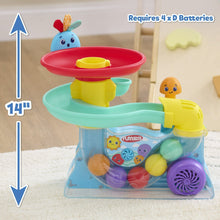 Busy ball popper toy with red top disc, teal base, and purple fan wheel.