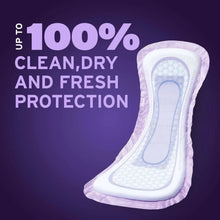 Overnight incontinence pad with clean, dry and fresh protection banner