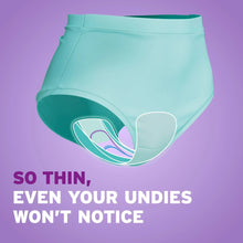 Ultra-thin incontinence pad tucked inside briefs