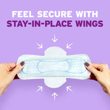 Ultra thin incontinence pad with wings, shown unfolded with curved backing for secure fit