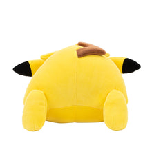 Sleeping Pikachu plush back with brown ear patch and black ear tips, yellow stuffed fabric