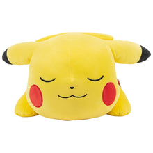 Sleeping Pikachu plush with closed eyes and red cheek patches, yellow stuffed fabric