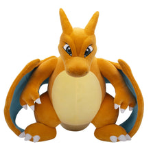 Charizard plush toy with orange wings, pale belly, and blue-lined tail