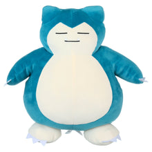 Sleeping Snorlax plush toy, teal body with white belly and closed-eye smile