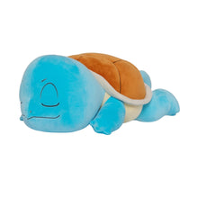Sleeping Squirtle plush in side view, blue head with small smile and orange shell