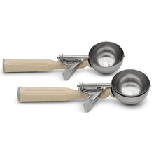 Two-piece portion scoop set with beige handles and stainless steel bowls