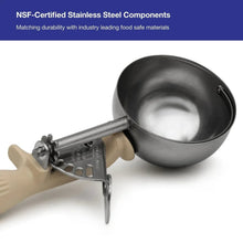 Stainless steel portion scoop with beige thumb press and wide metal lever