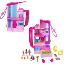 Pink dollhouse compact playset with open doors, micro dolls, and small accessories