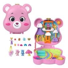 Pink bear-face compact toy with open playset and colorful accessories