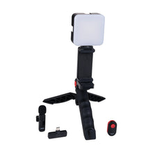 Portable LED video light kit with LED panel on tripod grip, plus wireless remote and mic