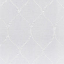Sheer curtain fabric close-up with trellis diamond pattern in white