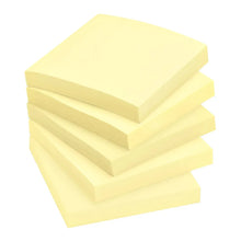 Stack of canary yellow sticky note pads
