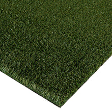 Artificial pet turf corner with green blades and dark edge backing