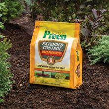 Preen Extended Control Weed Preventer bag on mulch near garden shrubs