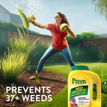 Preen Garden weed preventer plus plant food container with person applying to garden bed