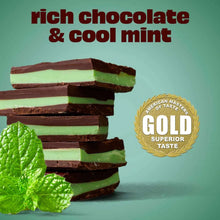 Premier Protein winter mint chocolate shake cartons stacked with mint and chocolate slices
