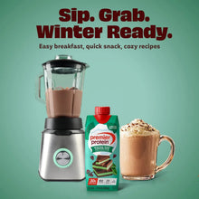 Premier Protein winter mint chocolate shake next to blender and drink