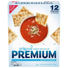 Saltine crackers box showing square crackers around a red dip and “Premium”
