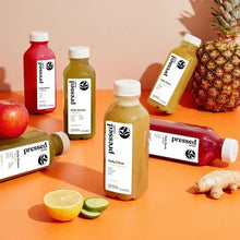 Pressed juice bottles and shots set with assorted colors and nutrition-label fronts