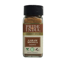 Garam masala spice blend bottle with dual sifter, black cap, brown spice powder