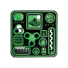 Green and black Super Fidget Board with circular, grid, and track fidget layouts