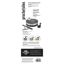 Proctor Silex crepe maker with black top, silver base, and included spatulas